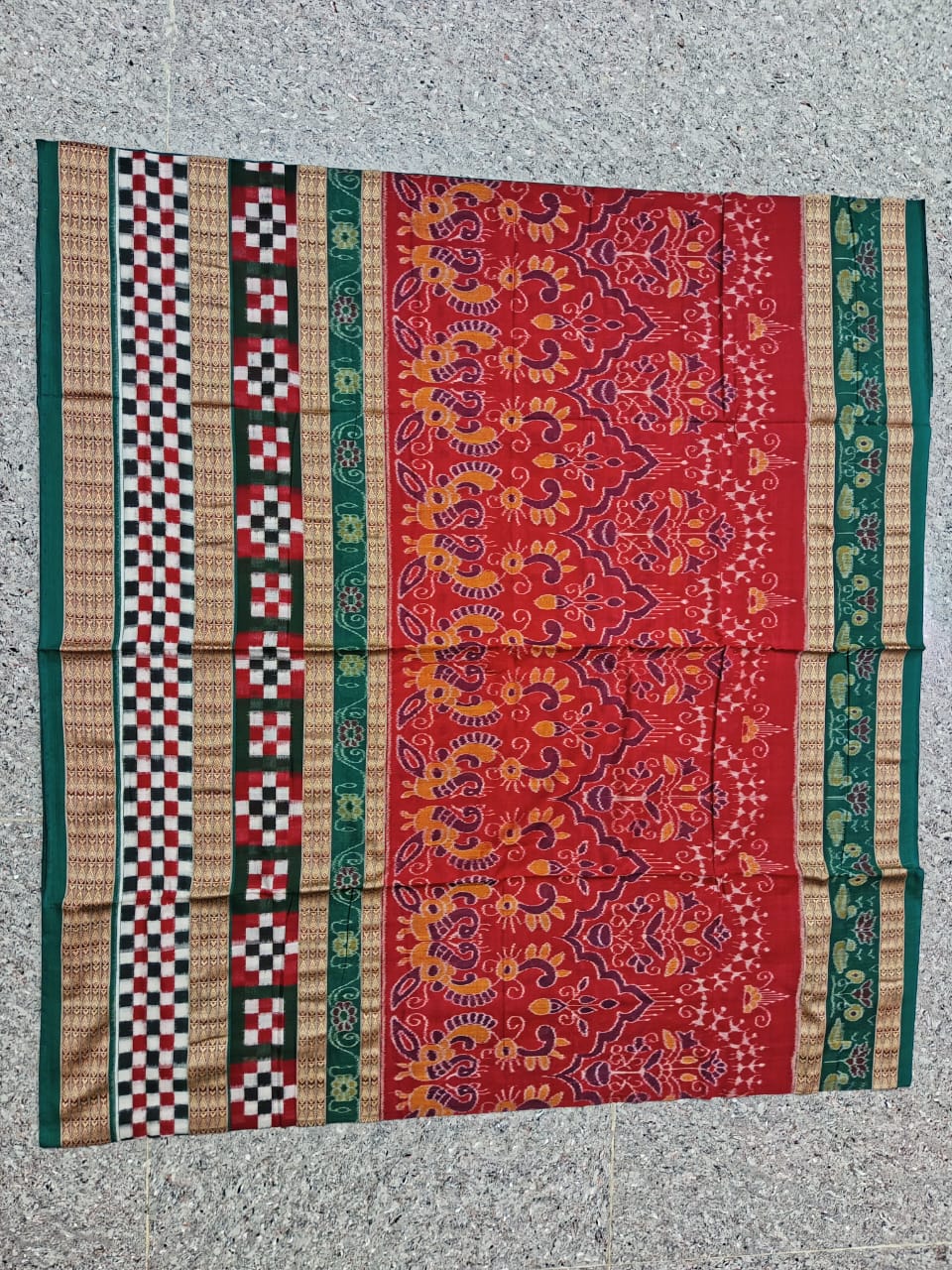 Red and green Sambalpuri saree with pasapali pattern, featuring small flowers, ducks, and pallu with signature checkered border design.