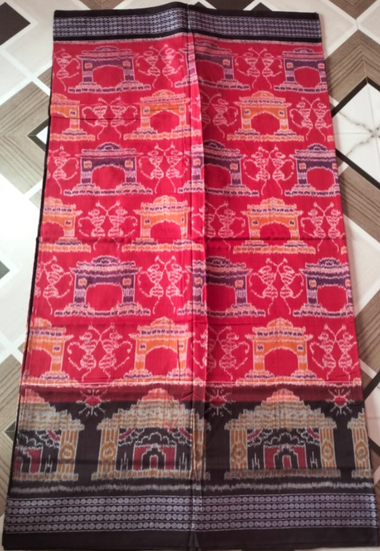 A red and coffee-colored Sambalpuri cotton saree featuring intricate Konark wheel motifs on the body and big round flower designs on the pallu.