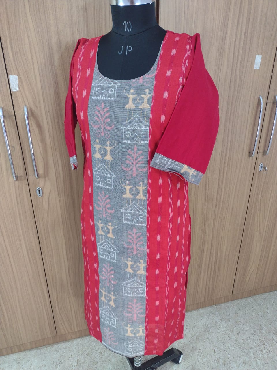 This red cotton dress features a traditional Pasapali pattern, offering a striking blend of heritage and modern style. (Copy)