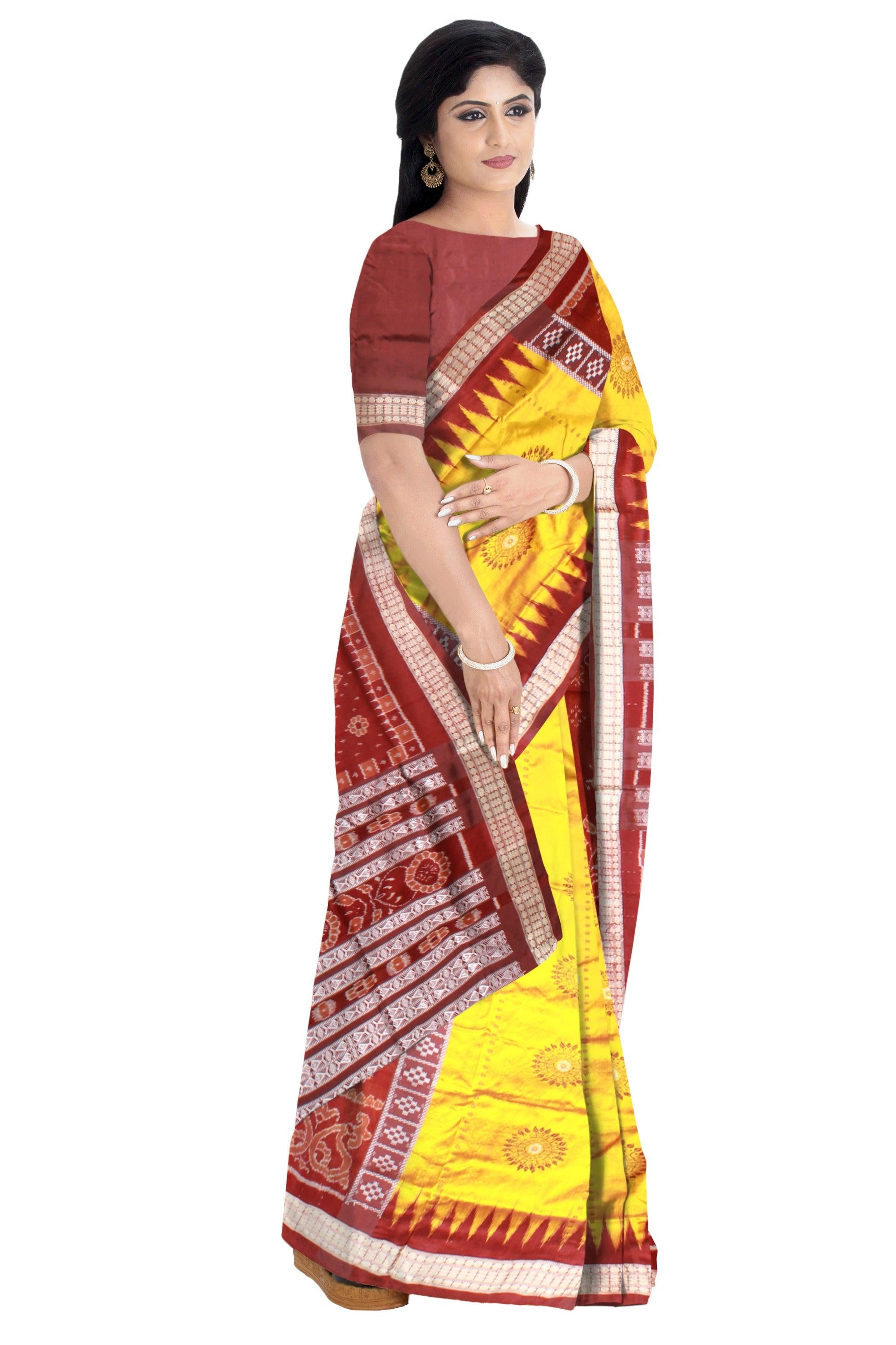 Yellow and red color small booty pattern Pata saree.